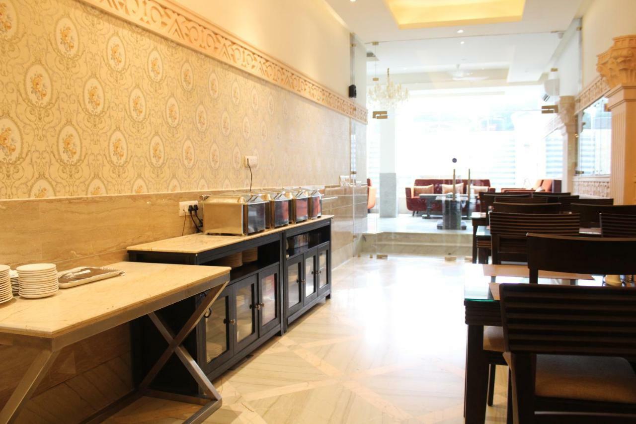 รอยัล เรสซิเดนซ์ สวีท Hotel คูร์เคาน์ ภายนอก รูปภาพ